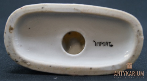 Porcelanowy świecznik z figurką z porcelany