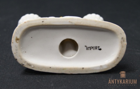 Porcelanowy świecznik z figurką z porcelany