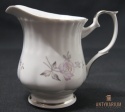 Porcelanowy mlecznik Chodzież malowany kwiaty